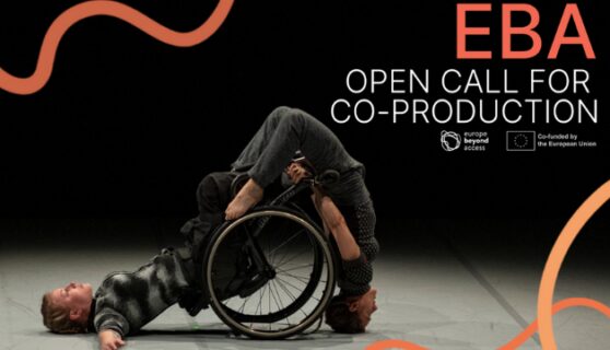 Europe Beyond Access Open Call for Co-Production. 'Fine Lines' by Roser López Espinosa / Skånes Dansteater, shows two performers draped over the same wheelchair. Europe Beyond Access. Photo ©Simone Cargnoni for Oriente Occidente.